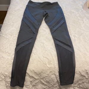 All grey leggings with mesh stripes